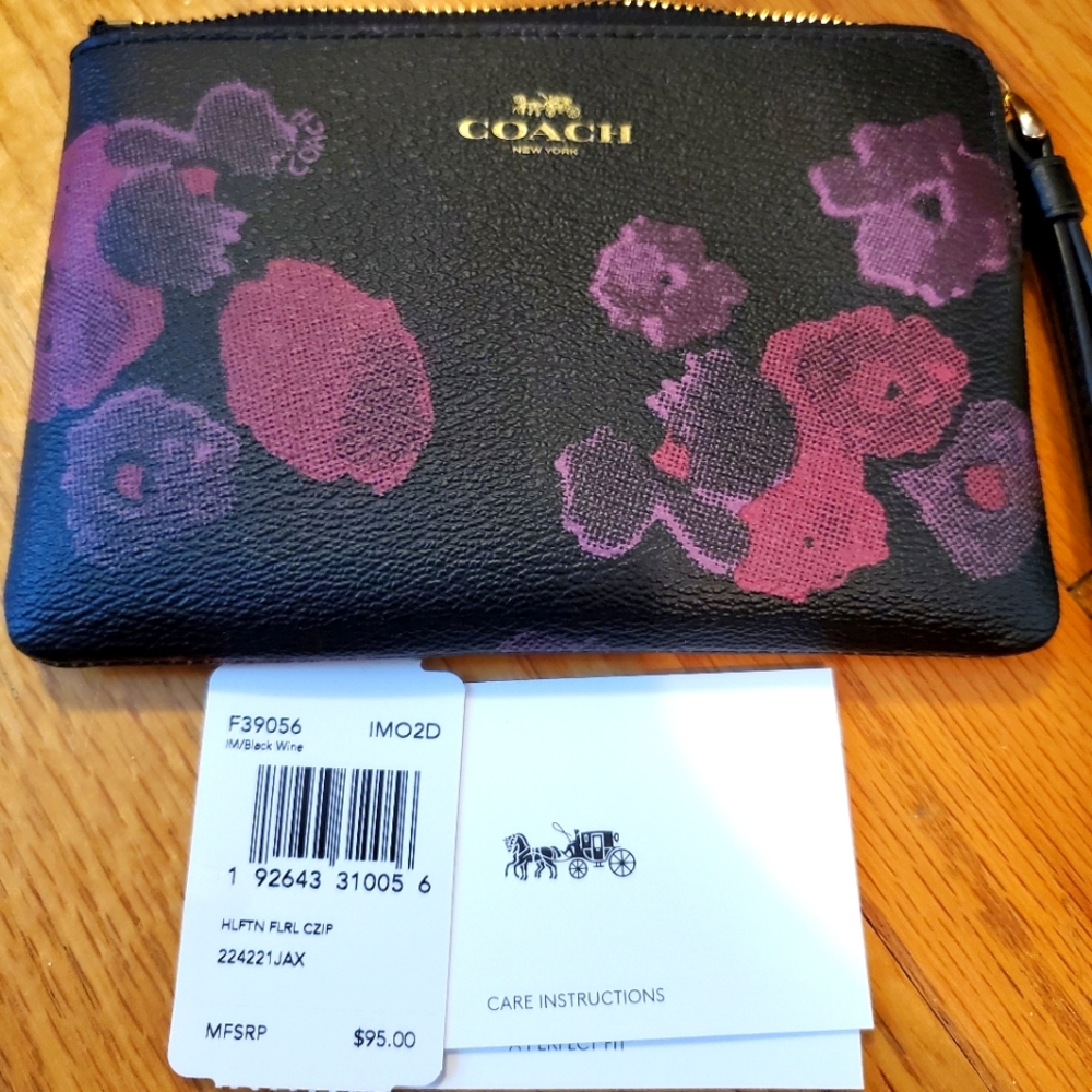COACH wine and black floral wristlet/clutch
